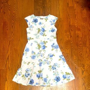 White with blue floral dress